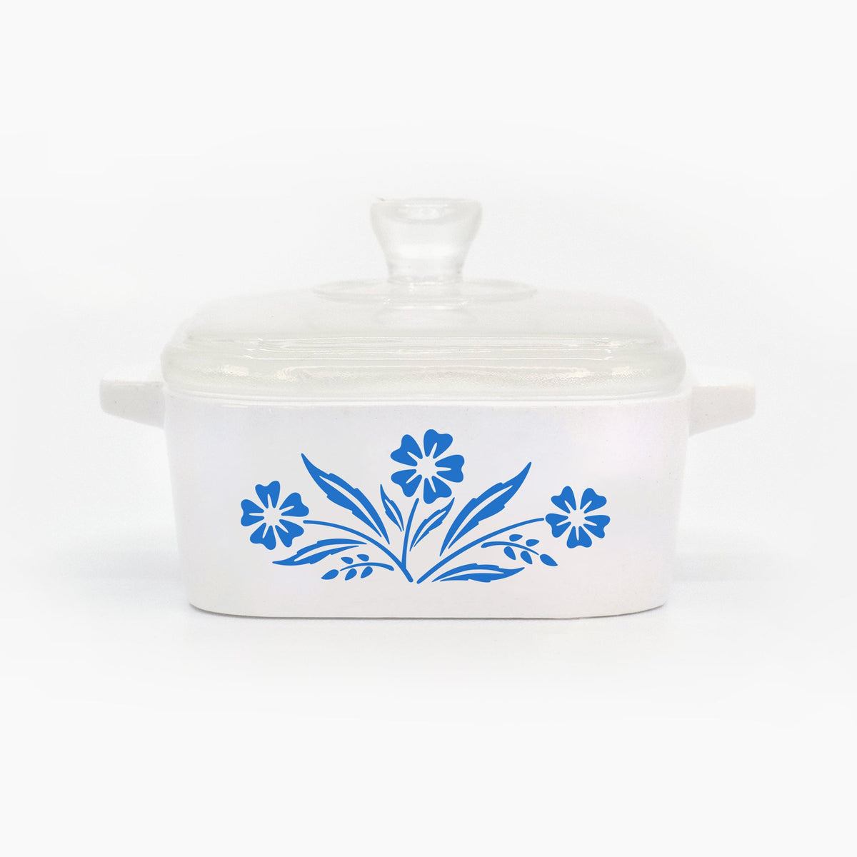 Mini trinket box with clear glass lid and blue cornflower floral motif on front