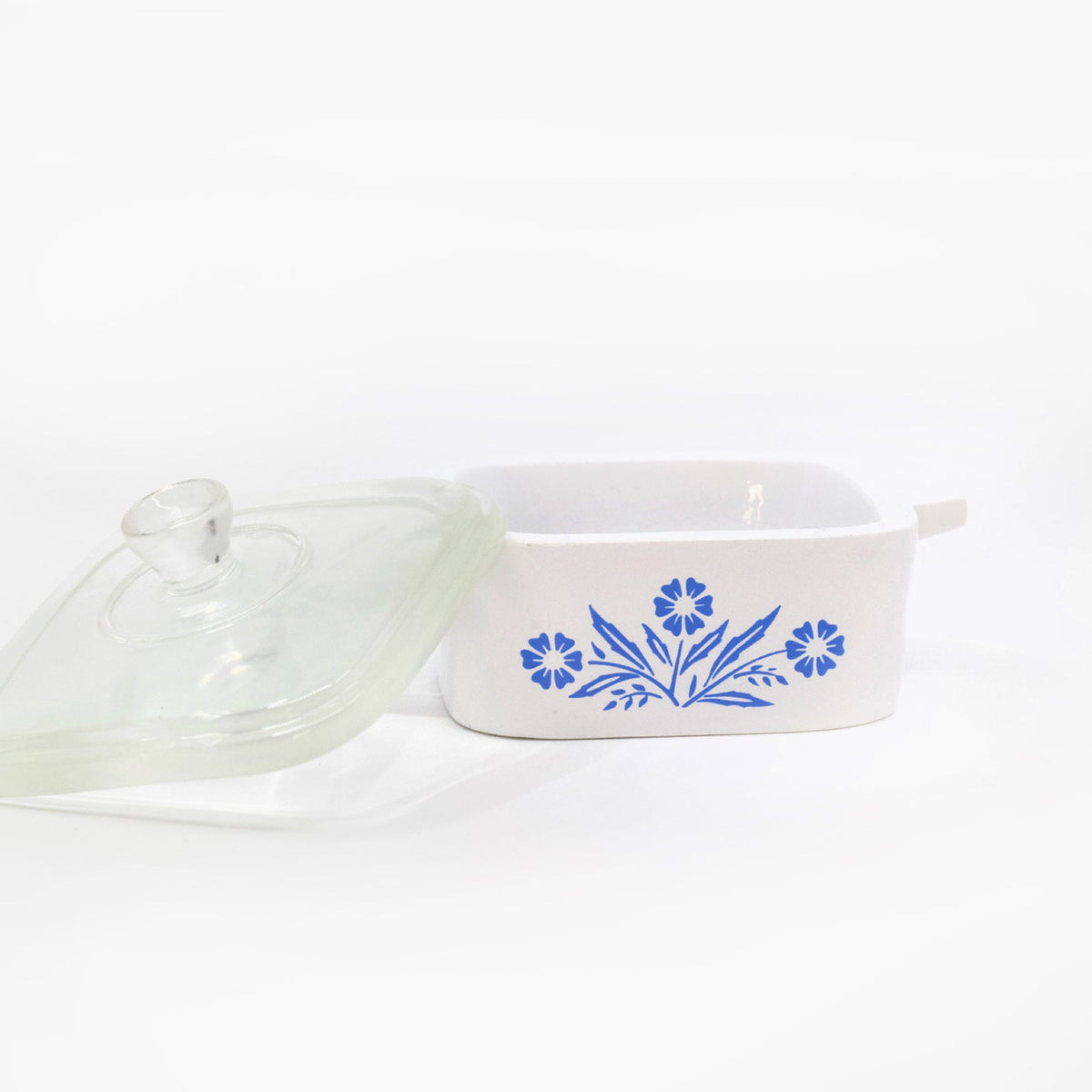 Mini trinket box with clear glass lid, blue cornflower print on white base
