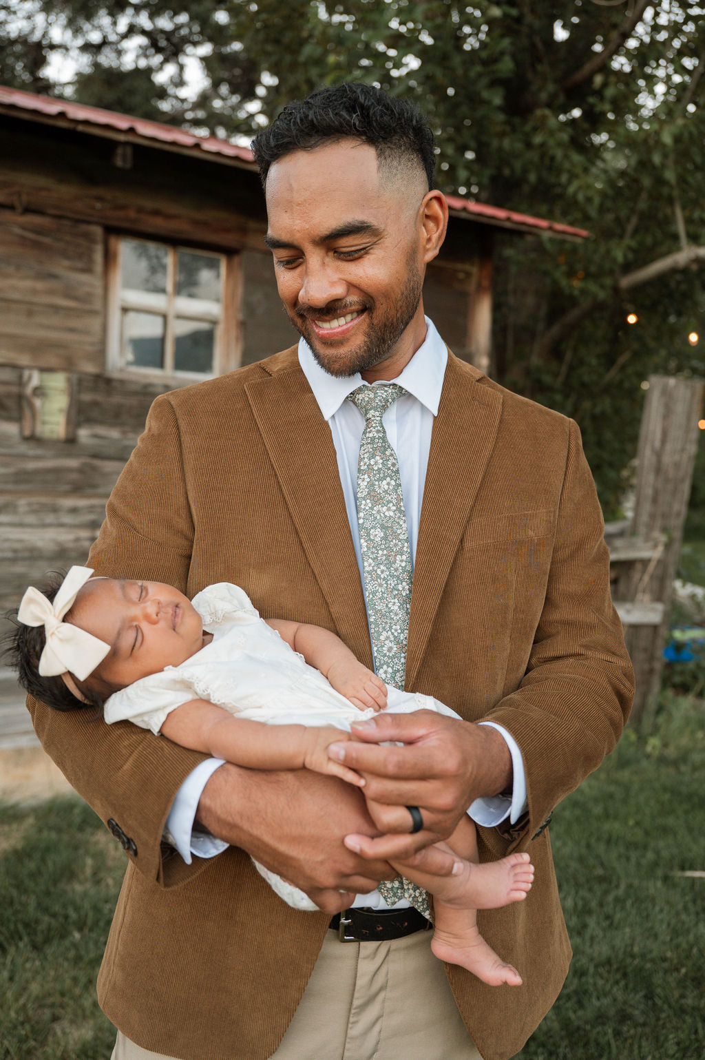 Men's floral tie, green base with white and orange flower details