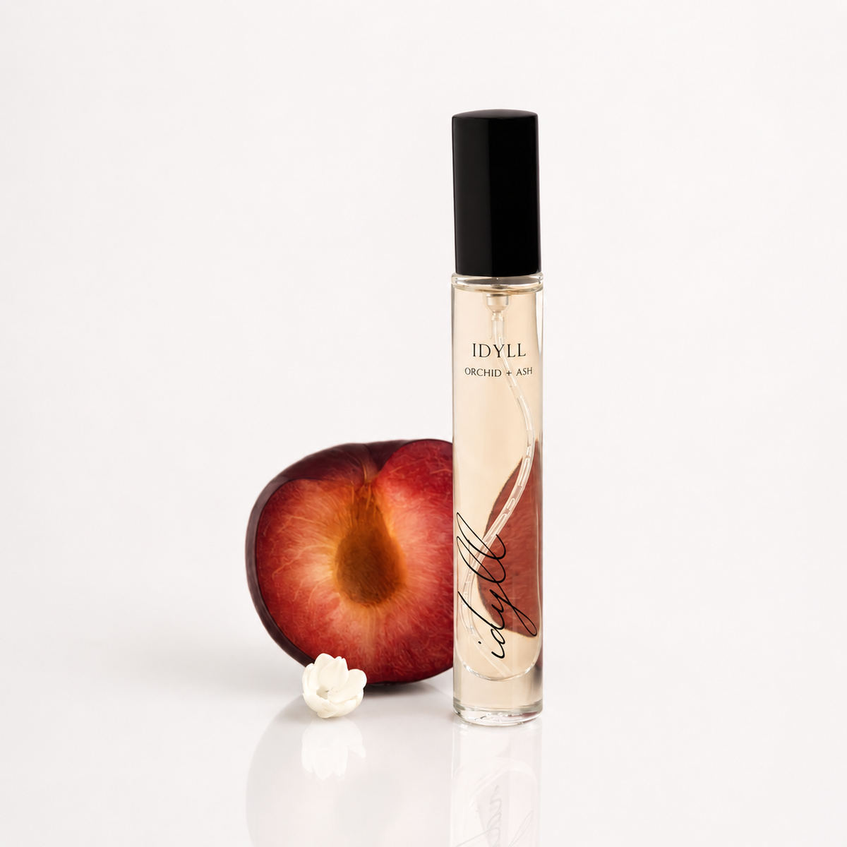 Jasmine incense & vanilla travel perfume spray bottle with black cap and red fruit detail