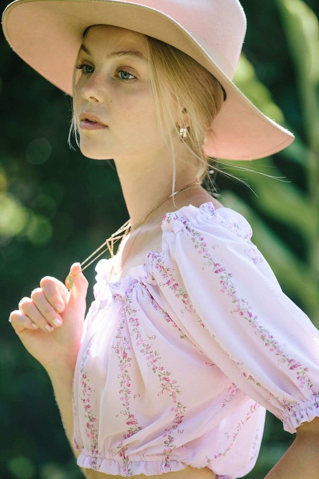 Light purple floral cropped blouse with puff sleeves and square neckline ruffle detail