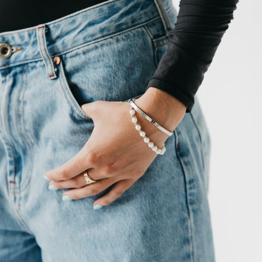 Silver beaded bangle bracelet with pearl accents