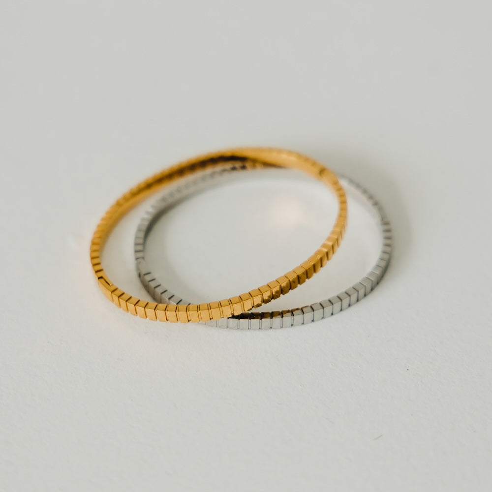 Gold and silver beaded bangle bracelet