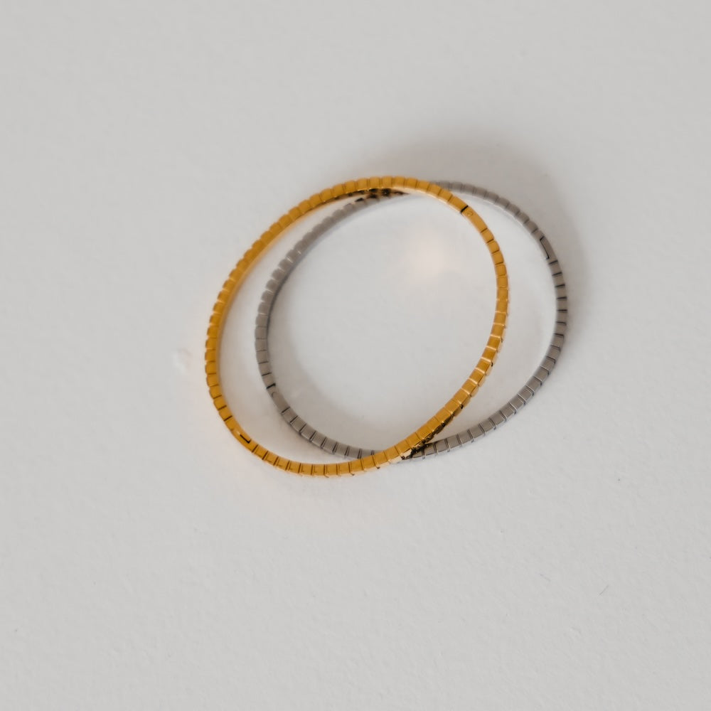 Stacked gold and silver beaded bangle bracelet