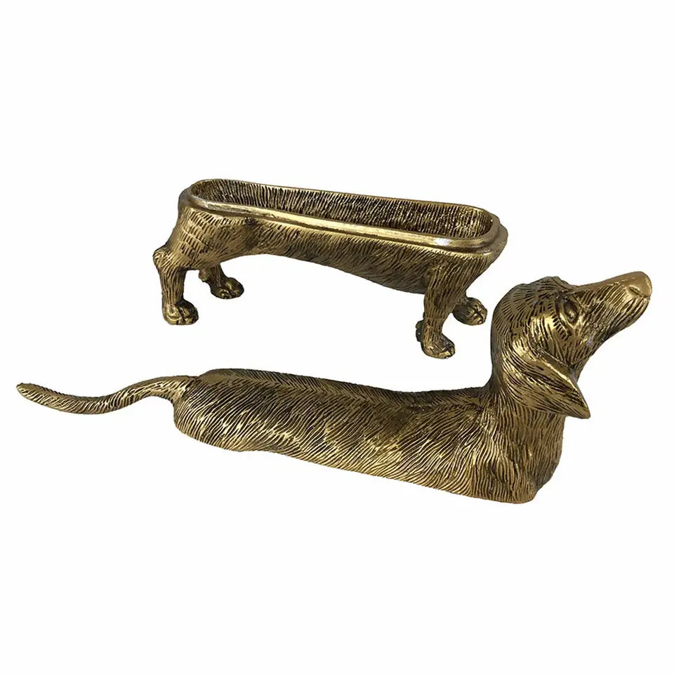 Brass-finish dog storage box shown separated into the lid and four-legged base