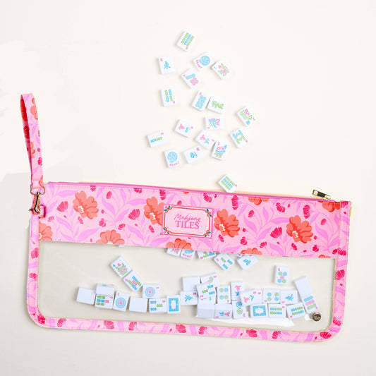 Hot pink floral Mahjong tile pouch with clear front window and zipper, plus tiles inside