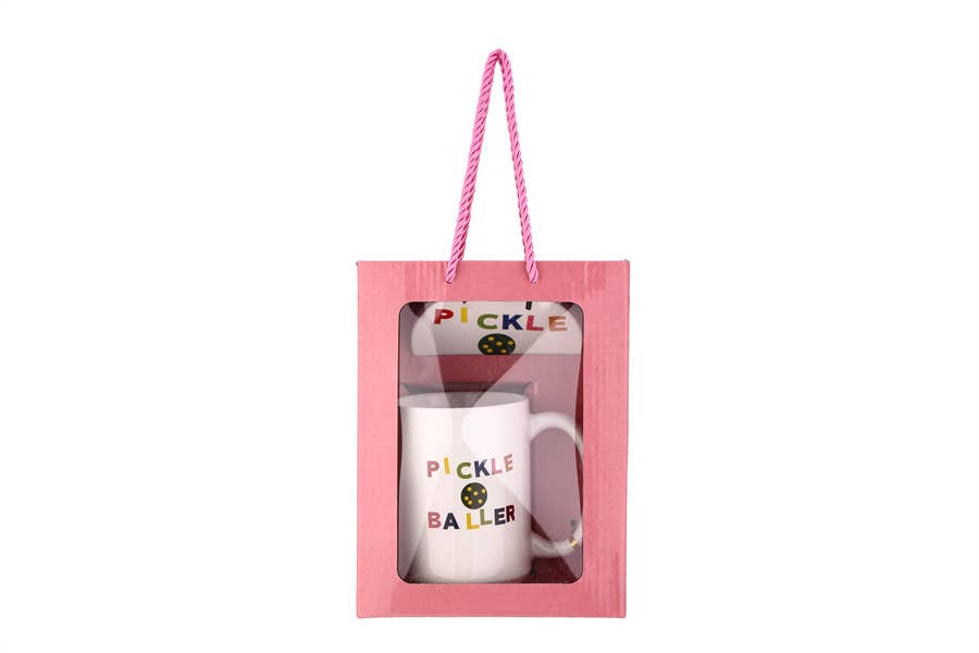 Pickle Baller mug and coaster set in a pink gift box with a hanging cord.