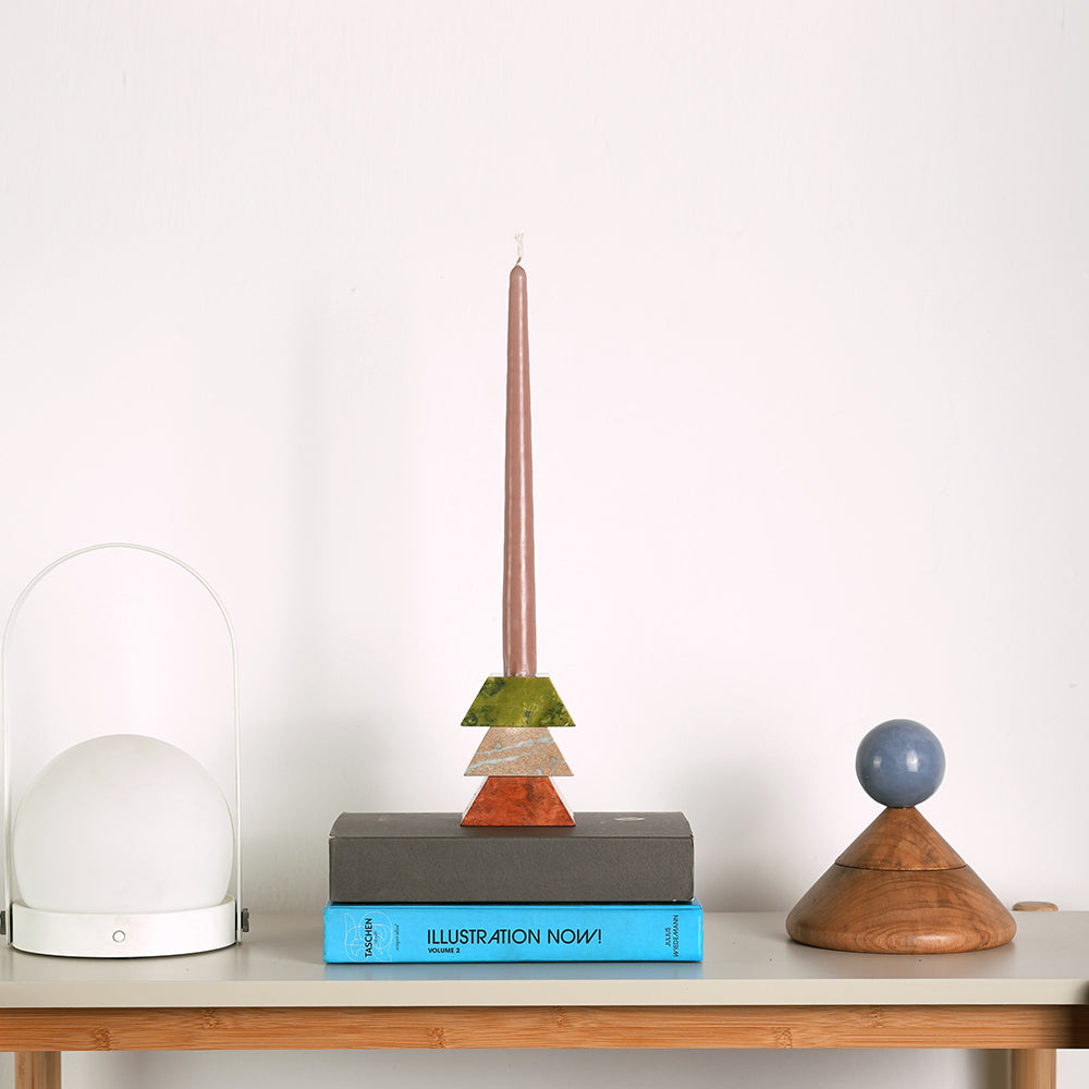 Triangular stackable candelabra with tall candle and three-piece base