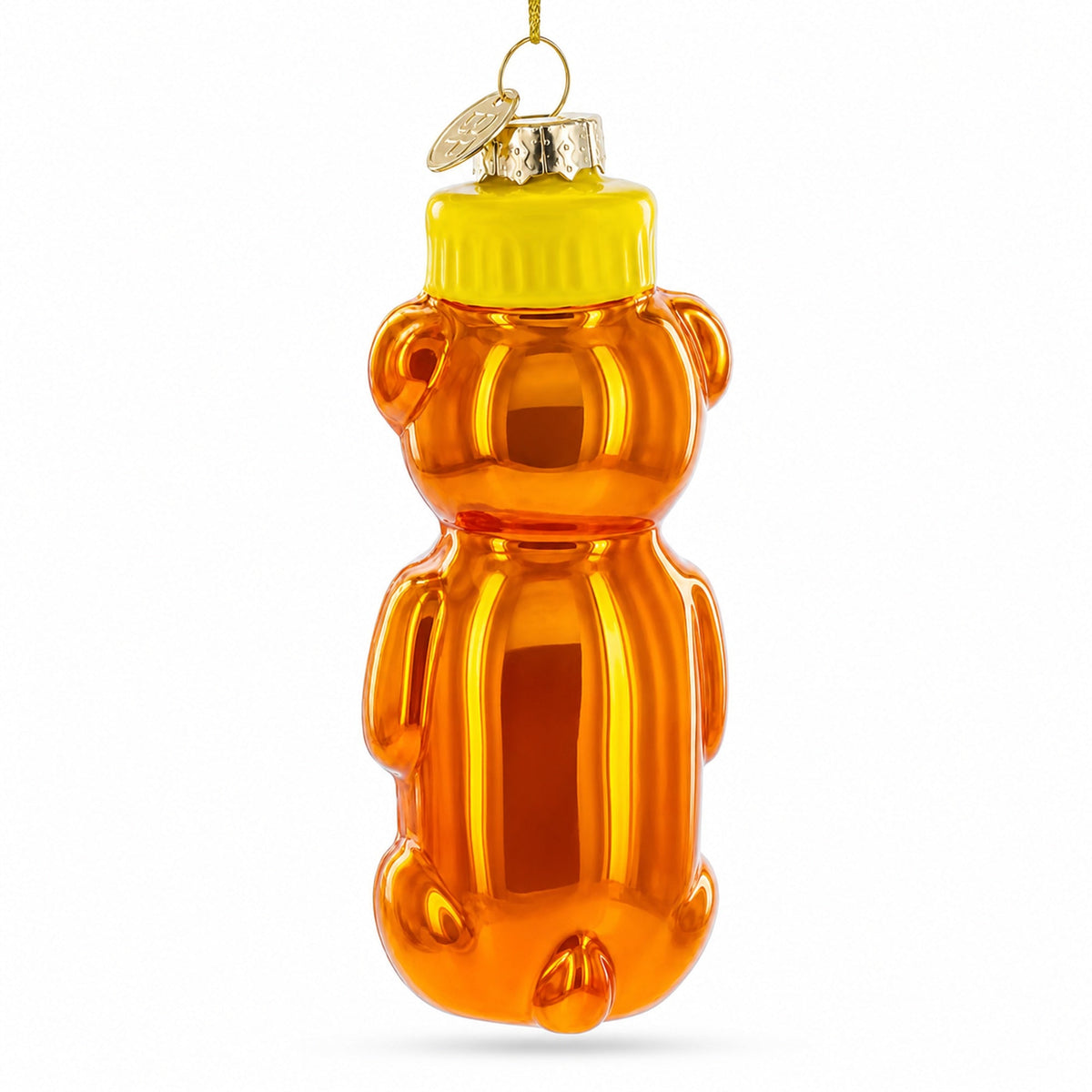 Glass honey bear ornament back view with hanging loop and glossy amber body