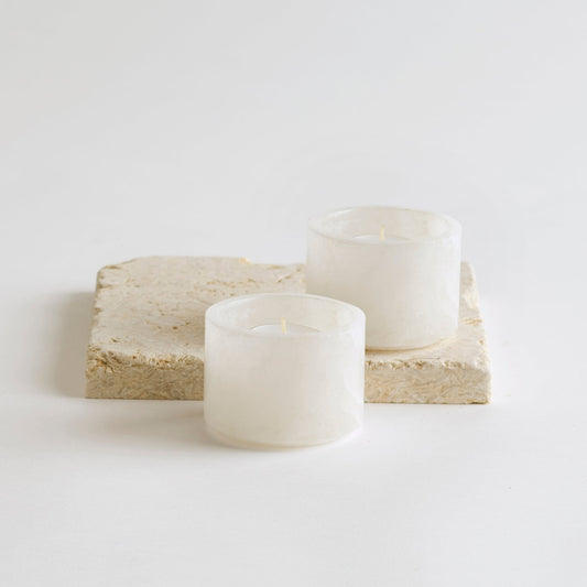 Santo alabaster footed bowls, set of 2, each with a lit candle