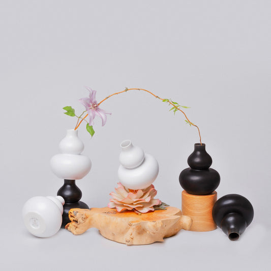 Heidi vase set of stacked bulb vases in matte white and black with floral stems