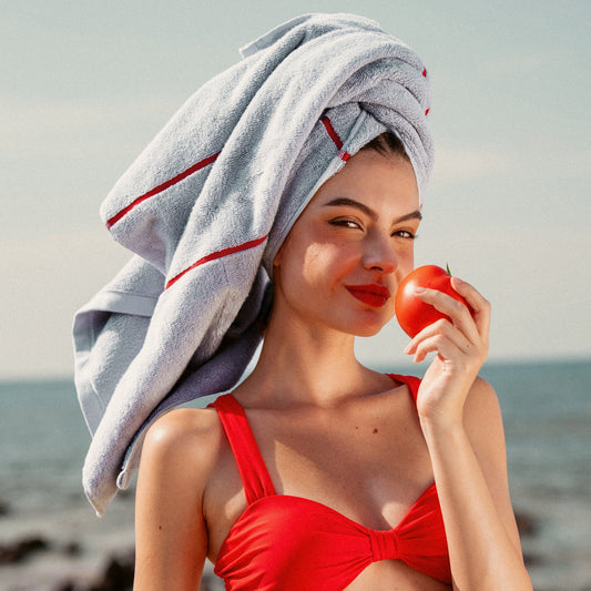 Cotton bath towel, light blue terry with red border stripe