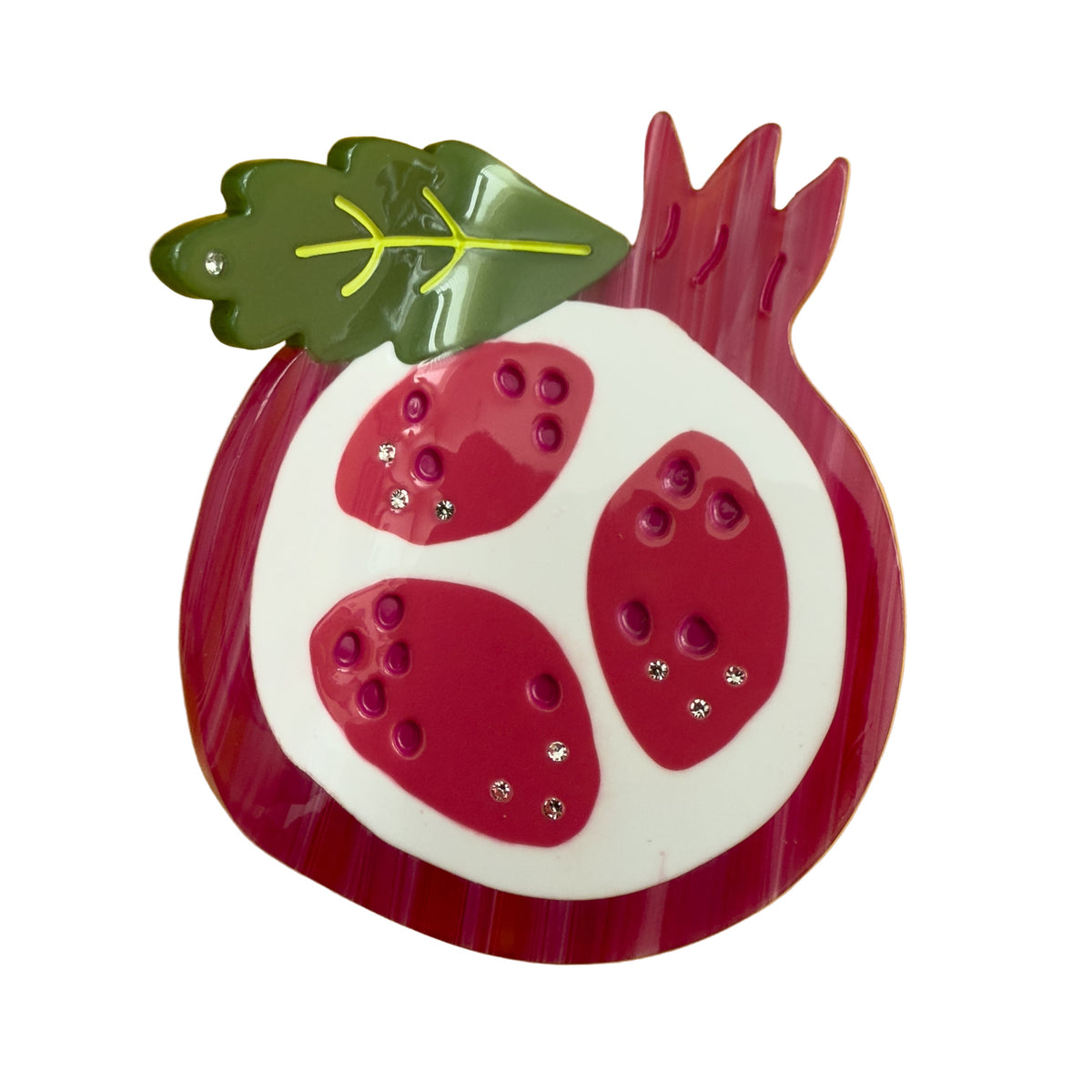 Pomegranate-themed hair claw with red and green leaves, white oval base, rhinestone details