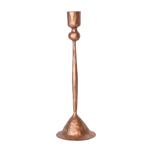 Tall copper taper candleholder with hammered texture and flared weighted base.