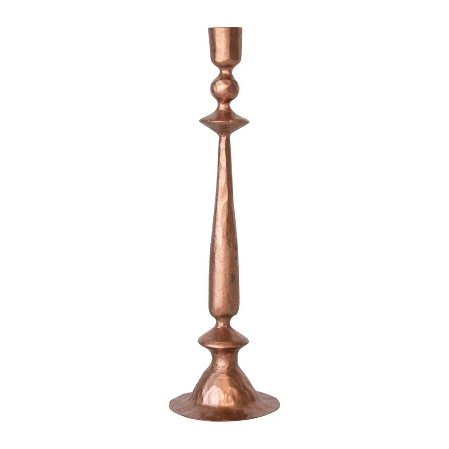Copper taper candleholder with short stem segments and rounded flared base.