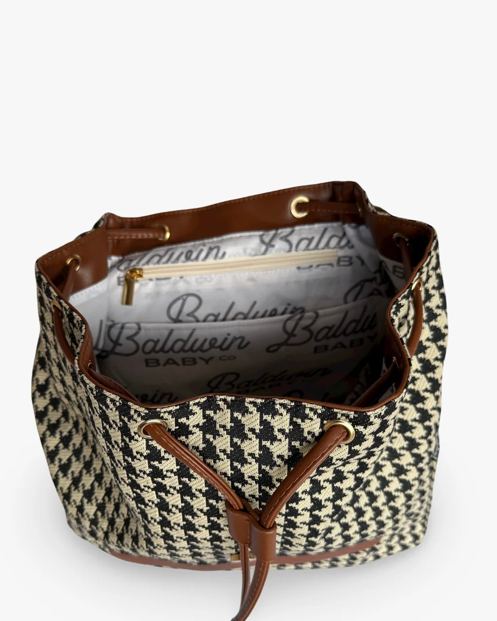 Open houndstooth diaper bag with branded lining and brown drawstring trim