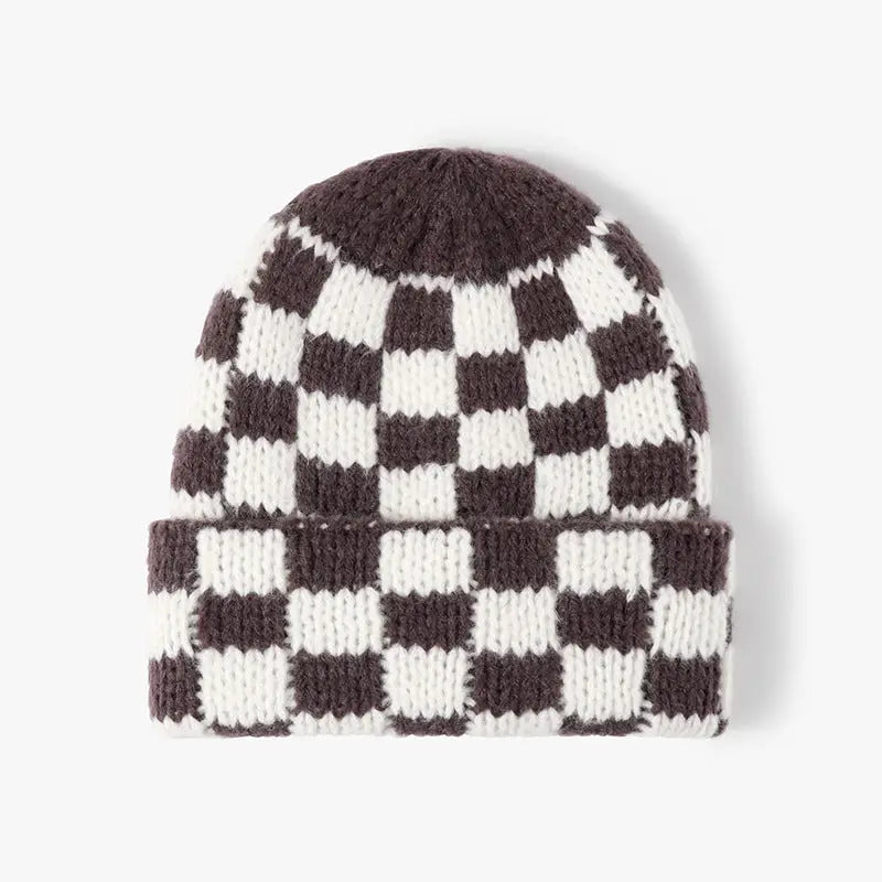 Chunky knitted beanie with a folded cuff and dark brown and white checker pattern