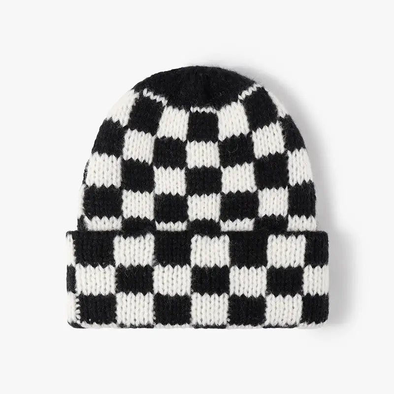 Chunky knitted beanie with a folded cuff and black and cream checker pattern
