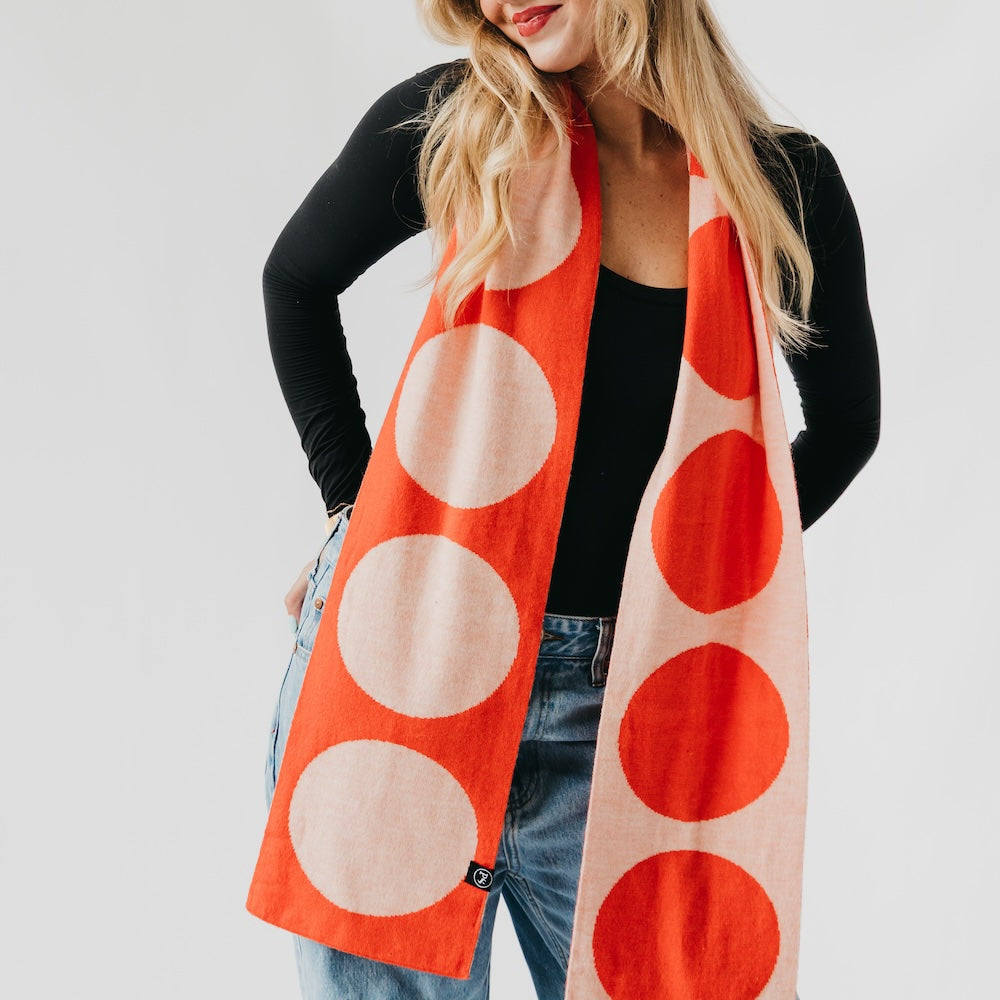 Orange scarf with large red and light circles, long drape with straight edges