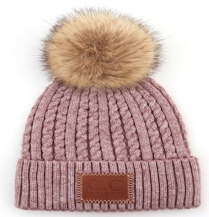 Mauve ribbed knit beanie with faux fur pom-pom and front logo patch