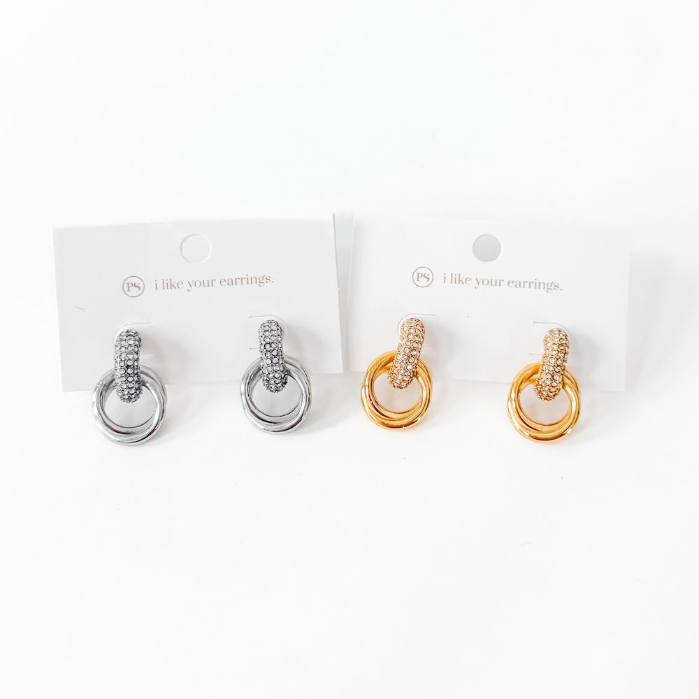 Display card with silver and gold double hoop diamond earrings, pair set