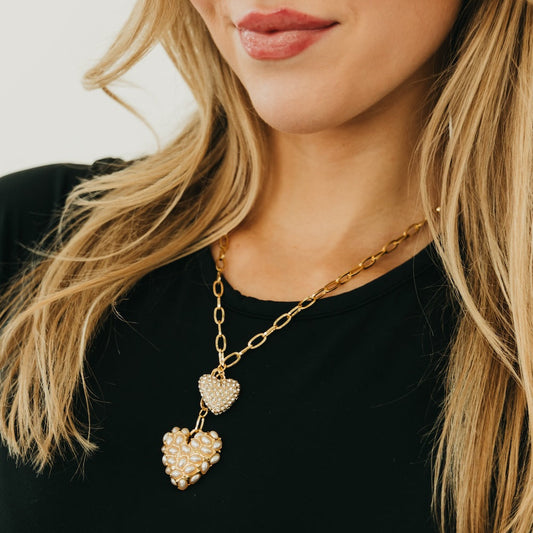Gold heart pendant necklace with pearl-like cluster charms, double-heart drop
