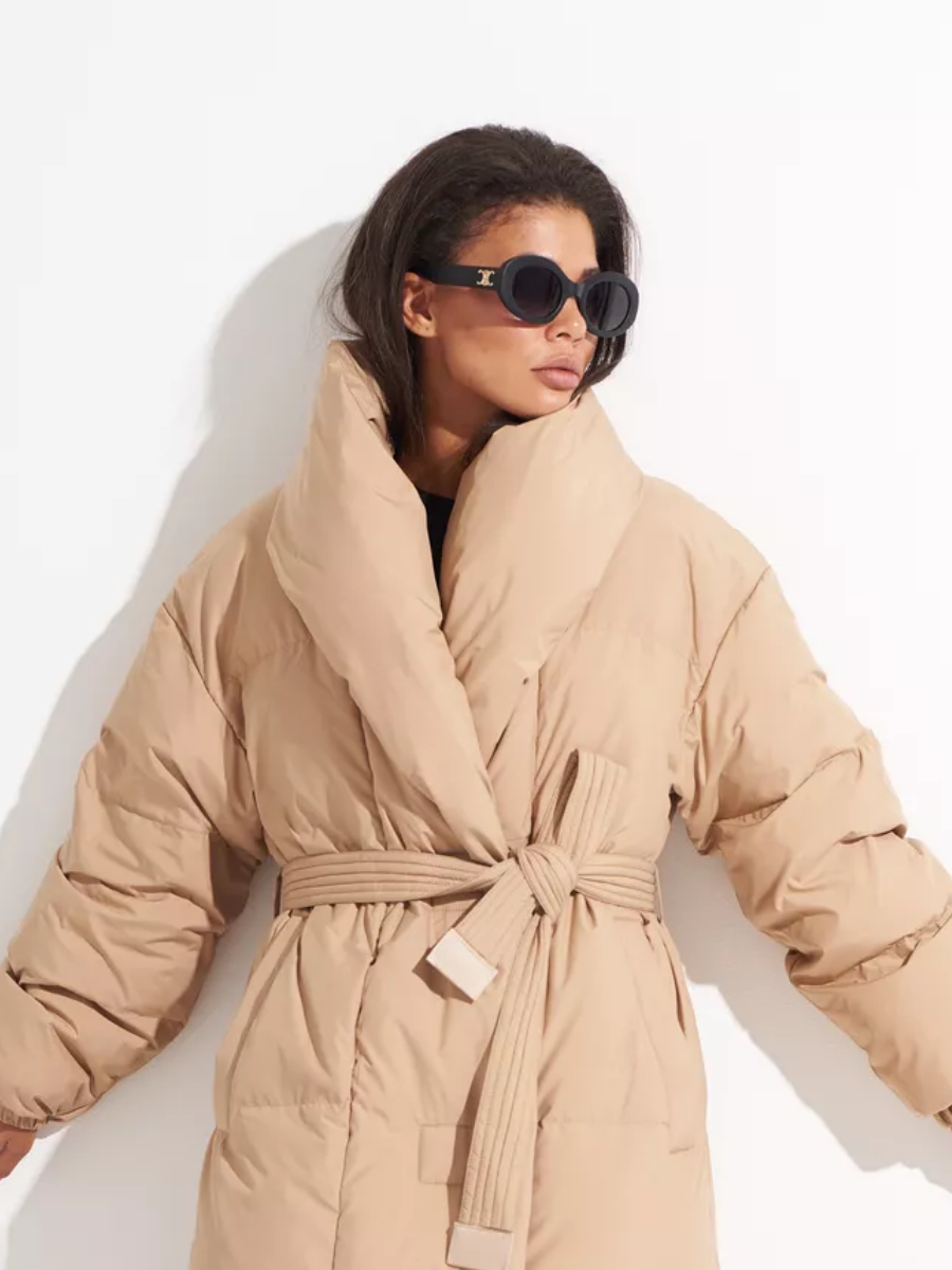 Caramel belted down coat with oversized collar and quilted sleeves