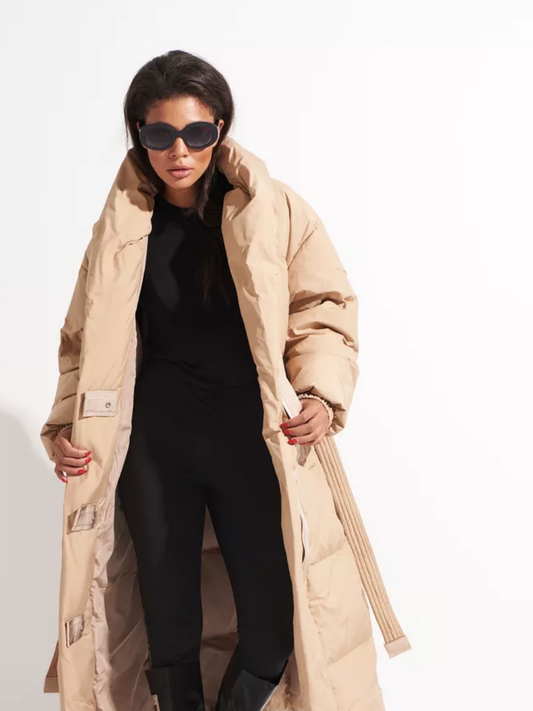 Open caramel insulated coat showing its inner snap closure and long belt