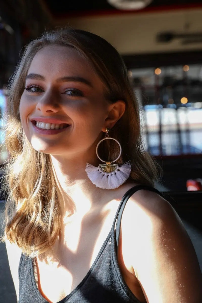 Gold hoop drop fan tassel earrings with white tassels