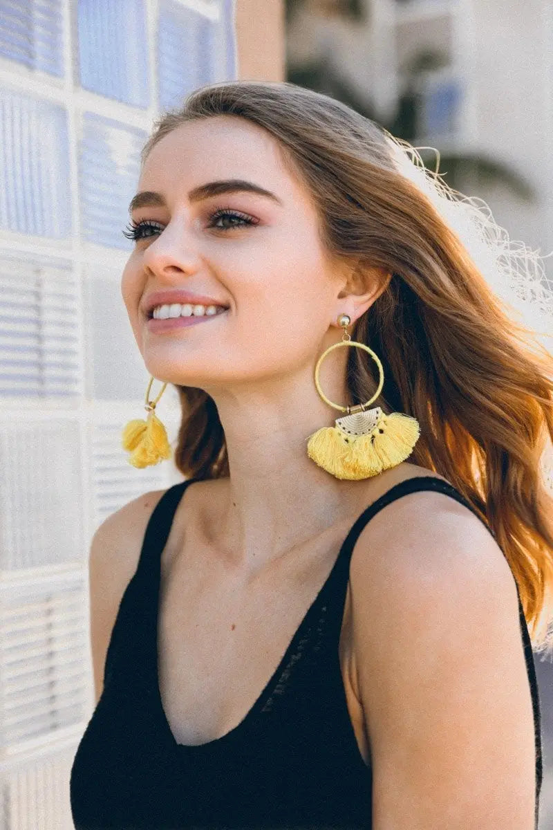Gold hoop drop fan tassel earrings with yellow tassels
