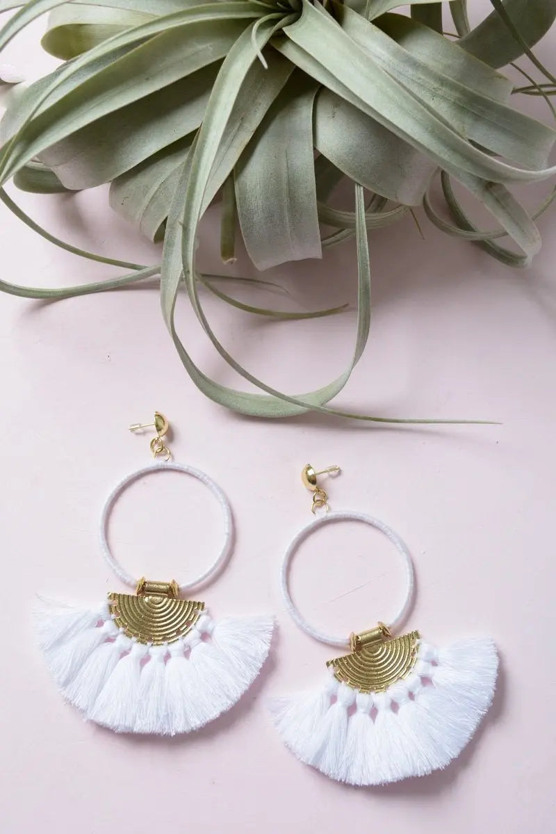 Gold hoop fan tassel earrings with white fringe