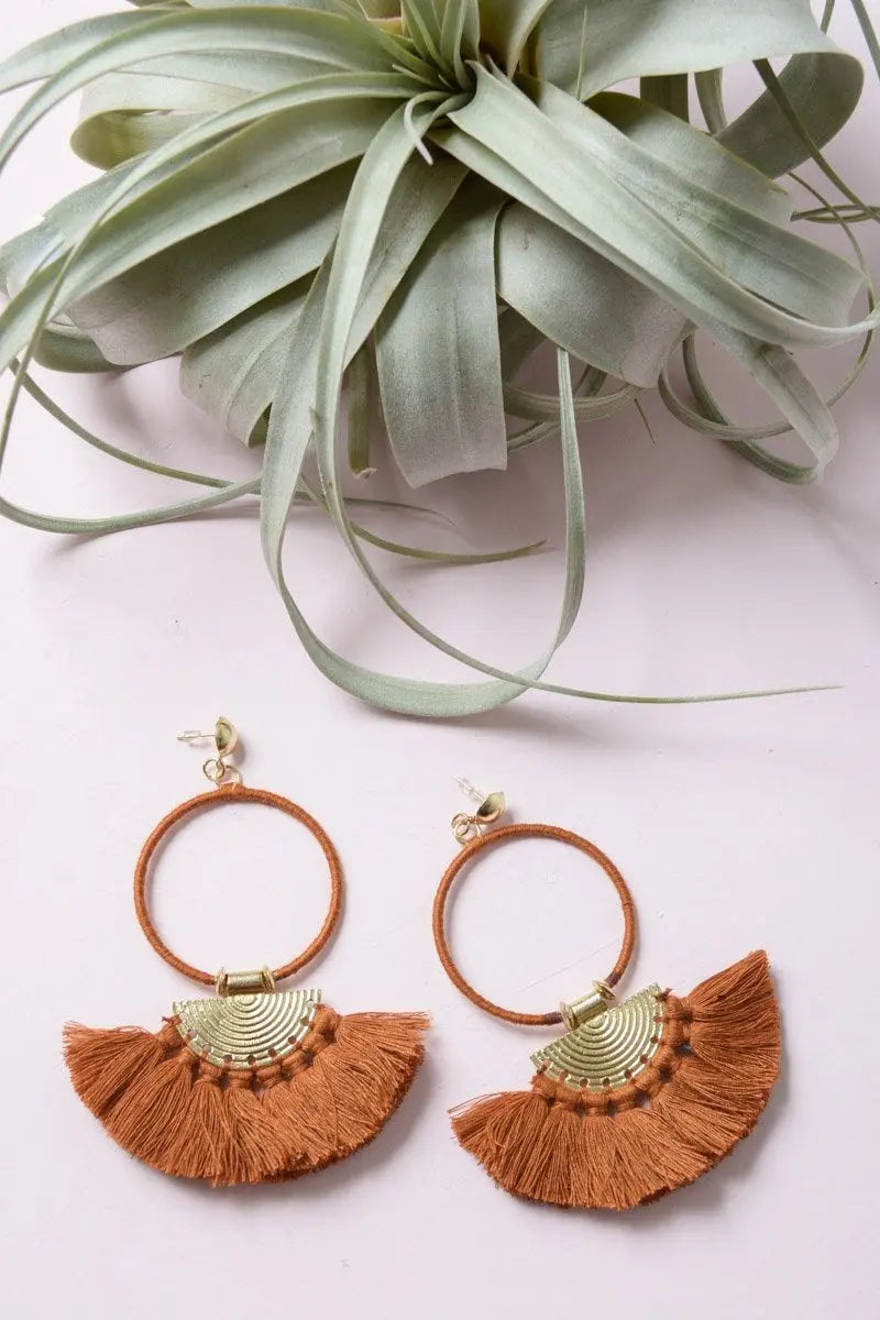 Gold hoop fan tassel earrings with orange fringe