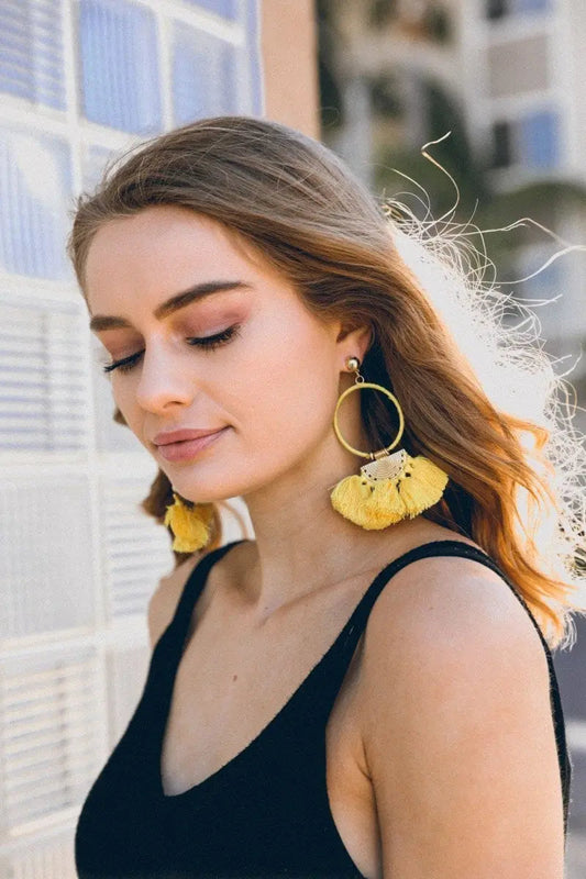 Gold hoop drop fan tassel earrings with yellow tassels