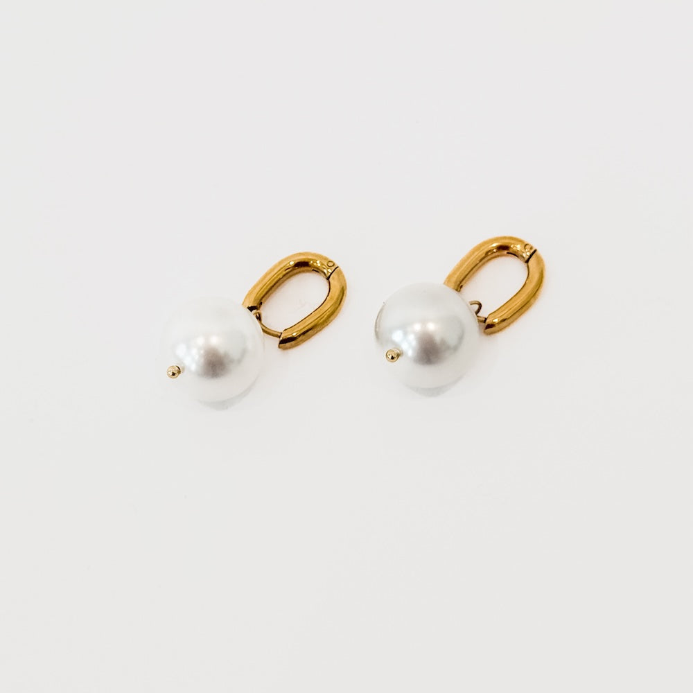 Gold-tone pearl drop huggie hoop earrings, pair view
