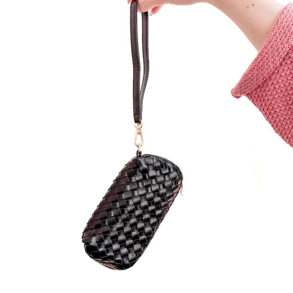 Woven black sunglass case wristlet with dark strap and gold zipper