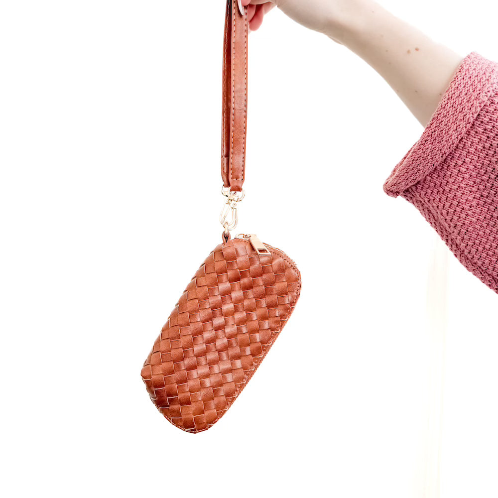 Woven sunglass wristlet case with braided checker pattern, zip top and wrist strap