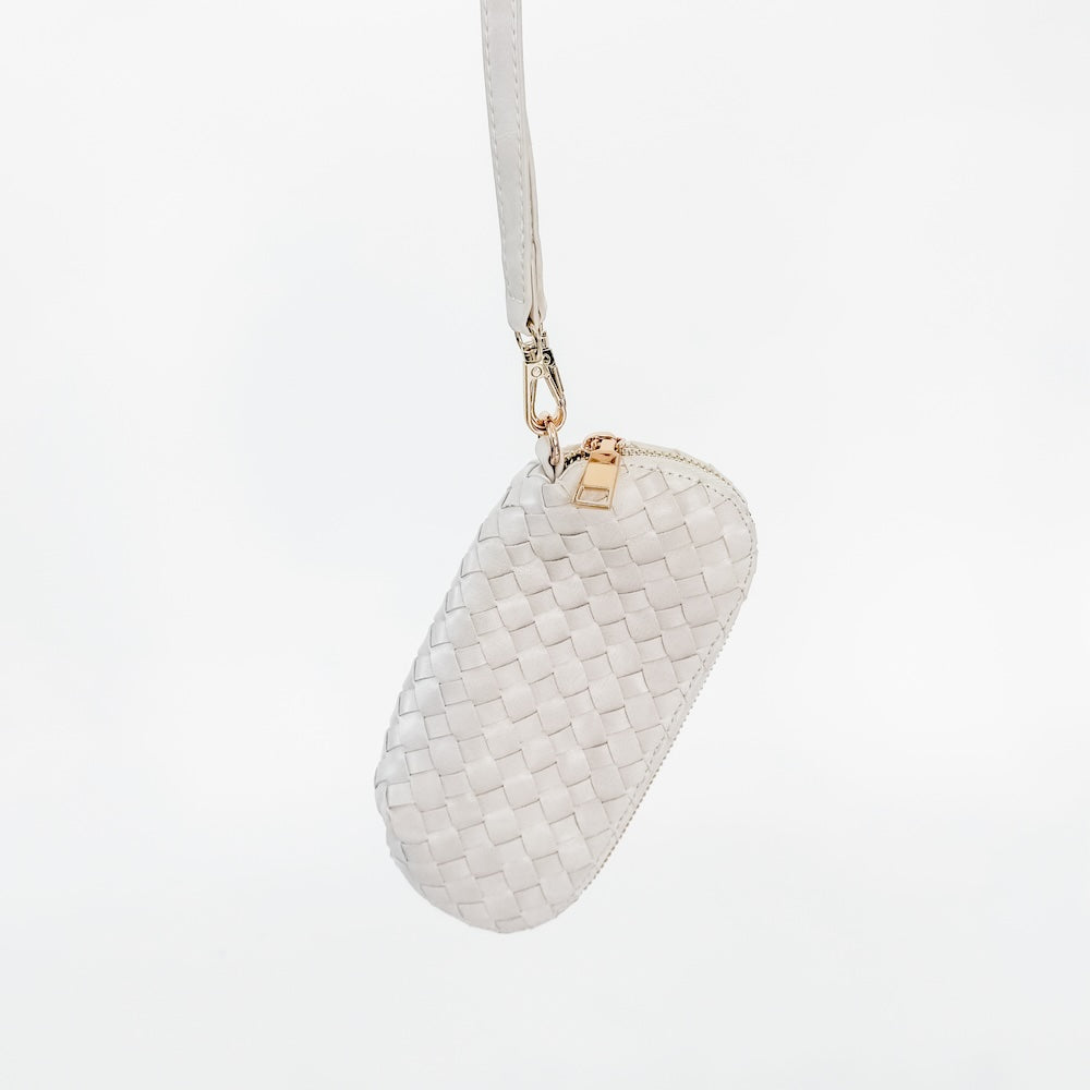 White woven sunglass case wristlet with long strap and gold chain hardware