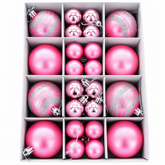 Set of pink mini plastic Christmas ornaments in a divided gift box