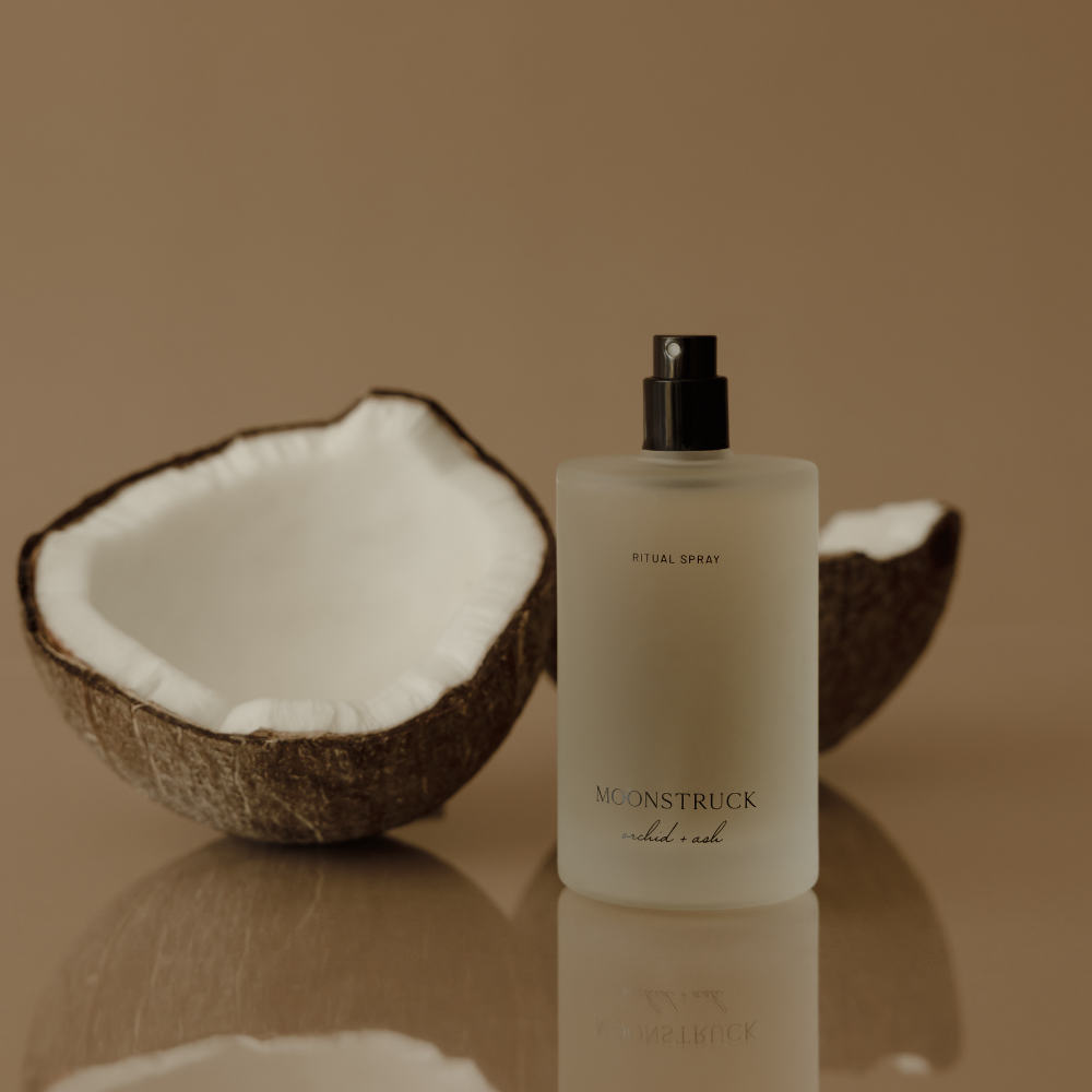 MOONSTRUCK ritual spray bottle with black pump, with open coconut prop