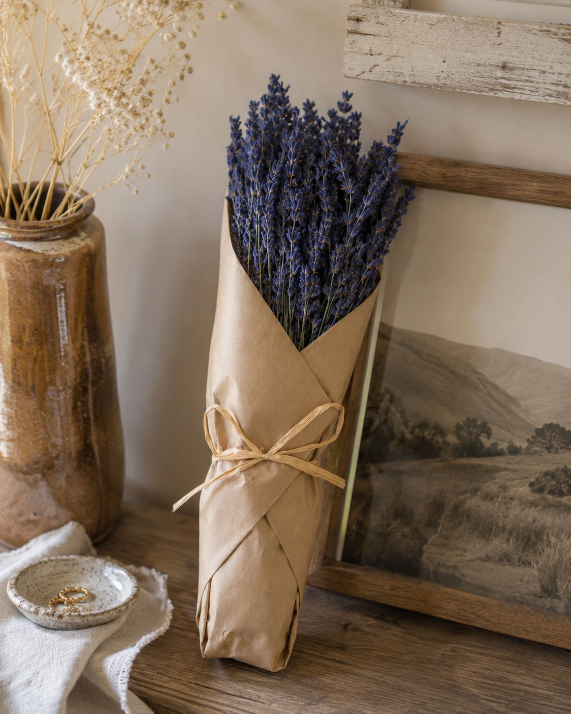 Dried lavender bouquet in kraft paper wrap tied with twine, standing bundle