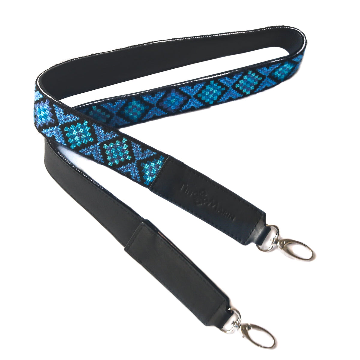 Two woven shoulder straps, blue geometric pattern with black leather ends and metal clasps
