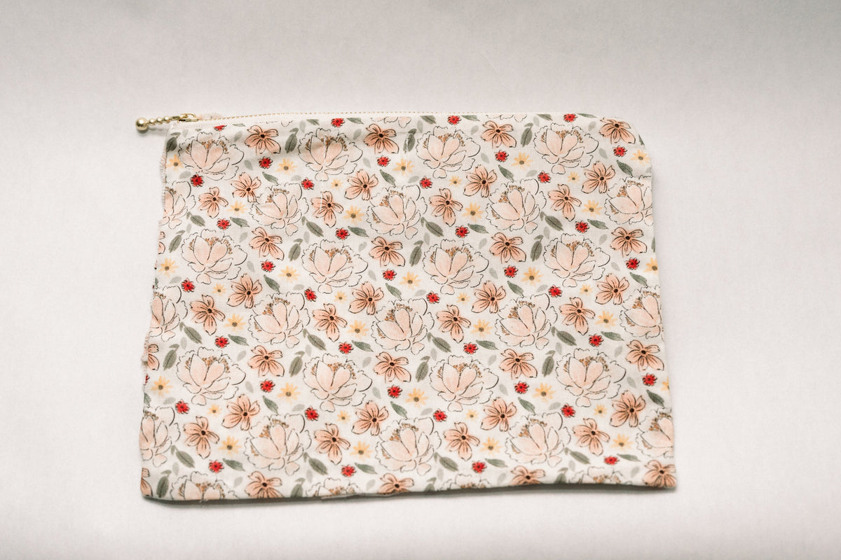 Primrose Garden floral zipper pouch back, cream with Petite Bouquet print and gold pull