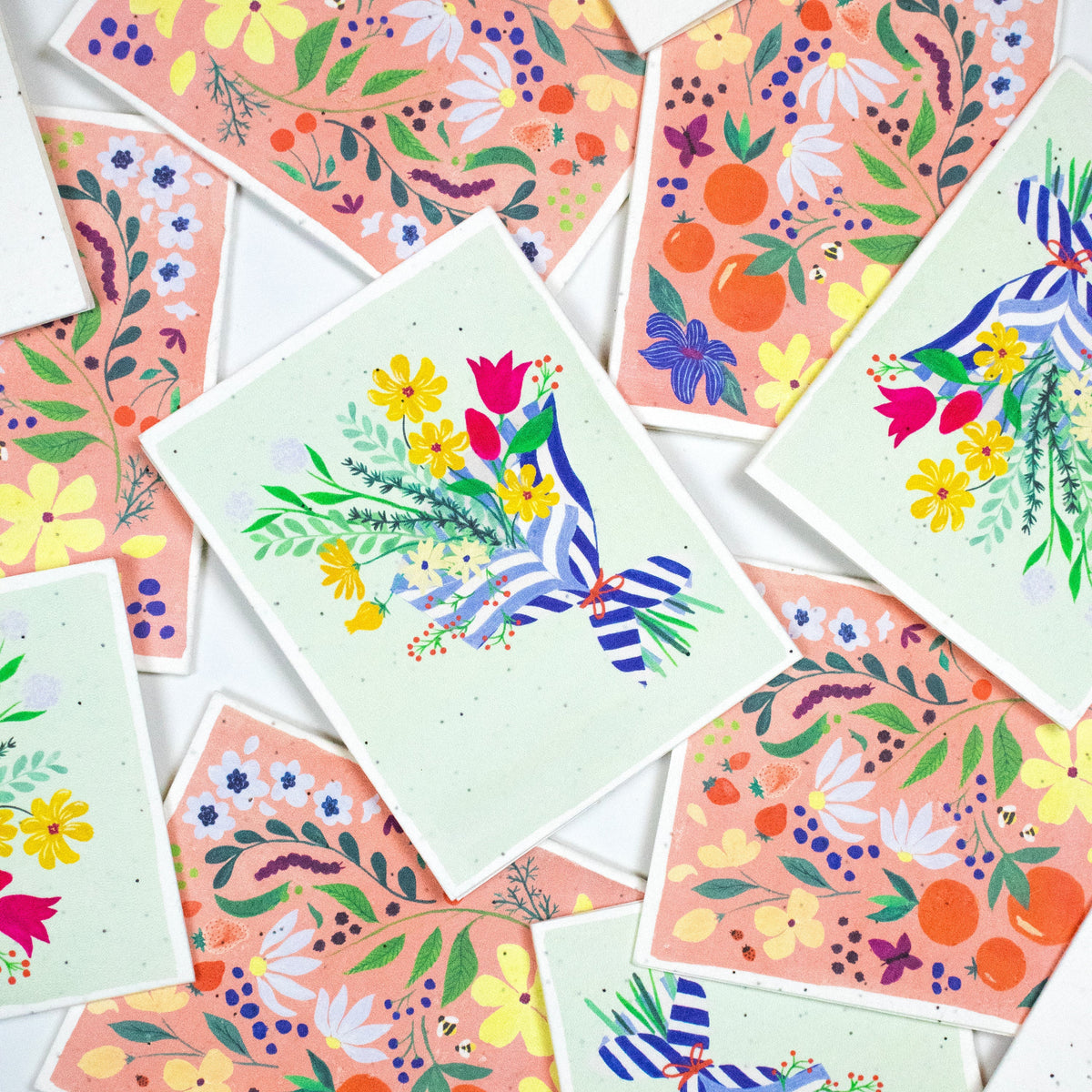 Set of floral seed cards with colorful illustrated botanicals and blue-striped ribbon accents