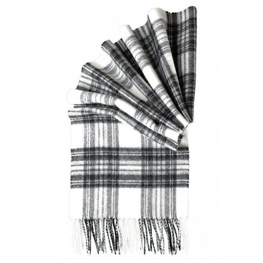 Merino lambswool tartan scarf in grey, black, and white plaid with fringed ends