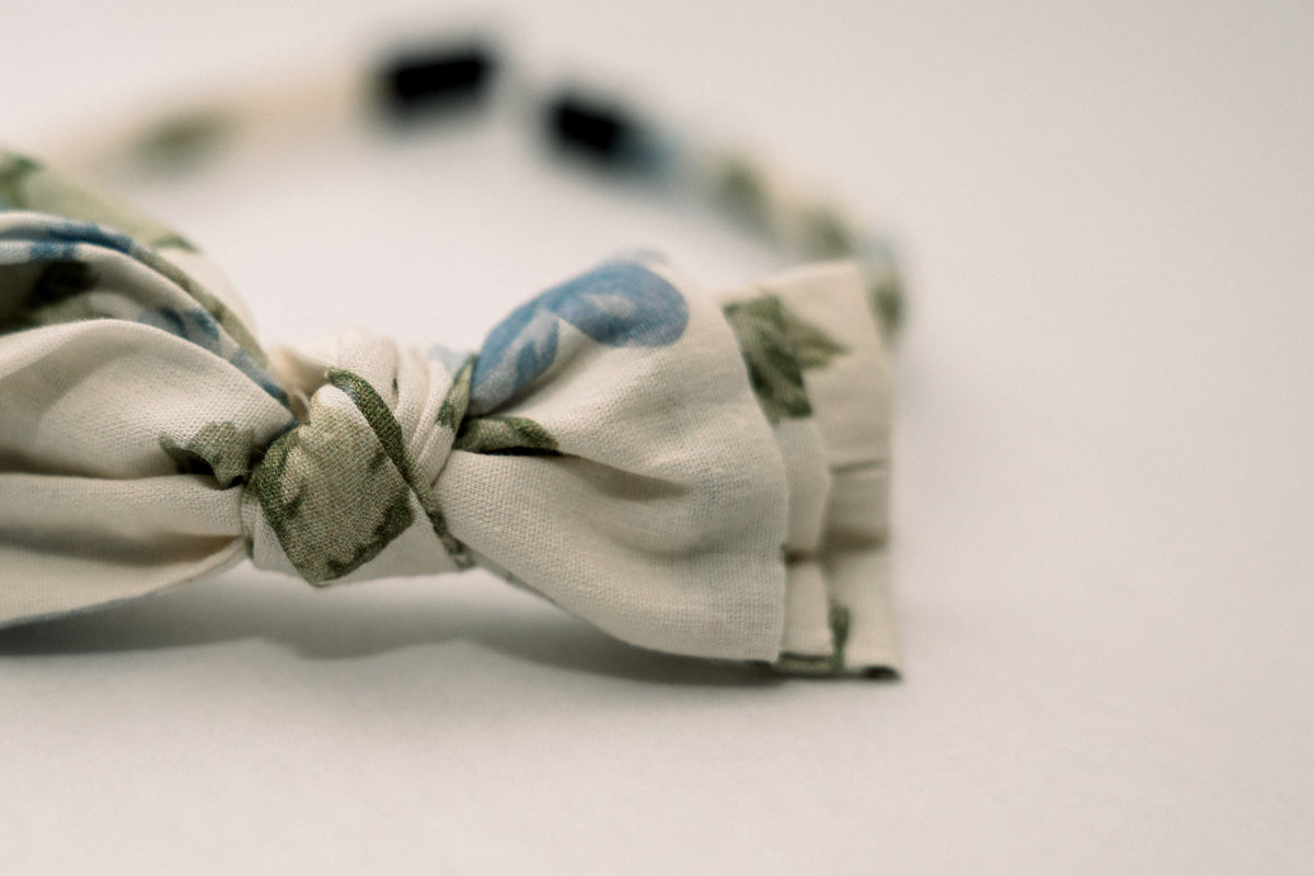 Three-bow headband, cream bow with cornflower blue dots and green leaf print