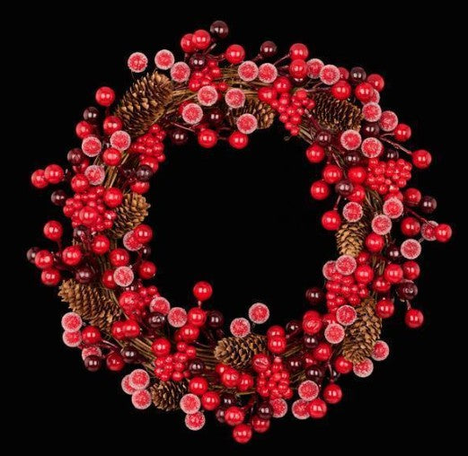 Iced berry and pinecone wreath with red berries, frosted berry slices, and brown pinecones
