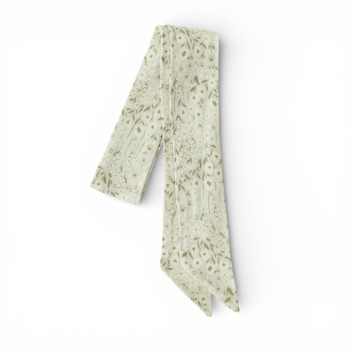 Cream hair sash with small green floral sprig print, long ribbon ties