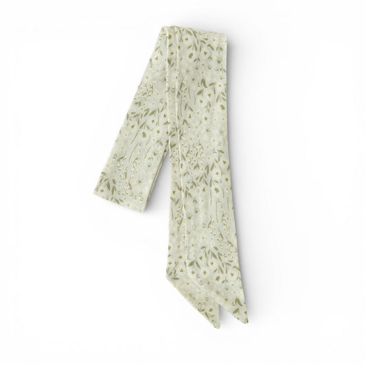 Cream hair sash with small green floral sprig print, long ribbon ties