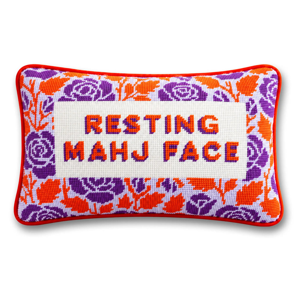 Needlepoint pillow with 'RESTING MAHJ FACE' text, orange and purple floral pattern