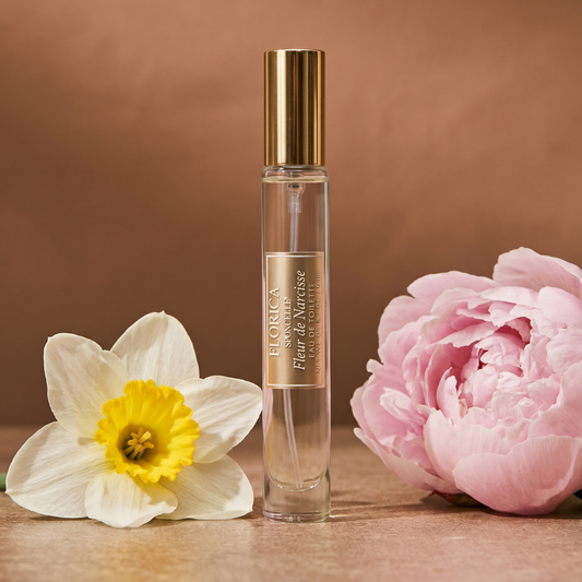 Eau de toilette spray bottle with clear glass and gold cap; Florica Fleur de Narcisse
